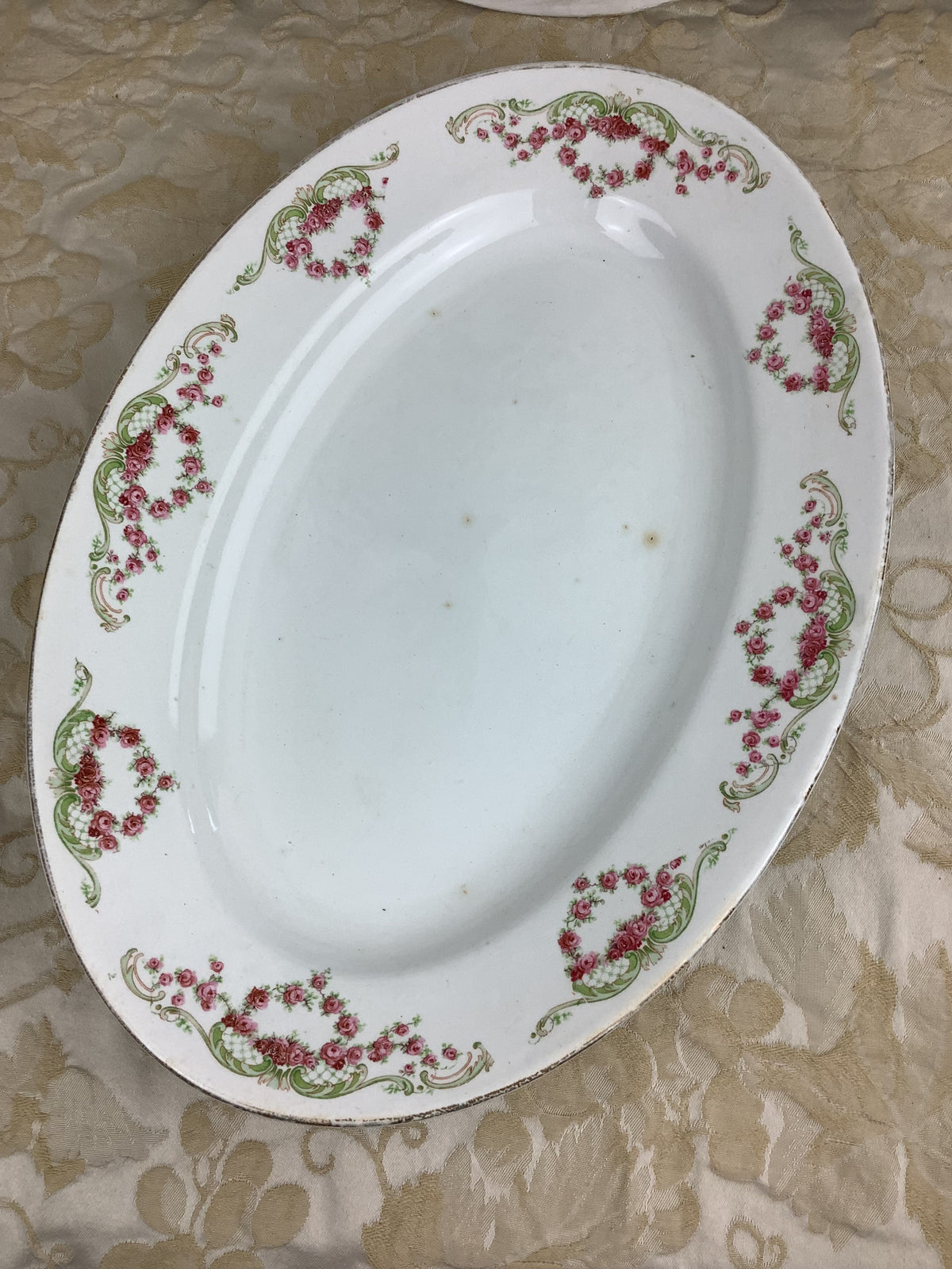 Ancien Plat de forme ovale Terre de fer Moulins des loups France