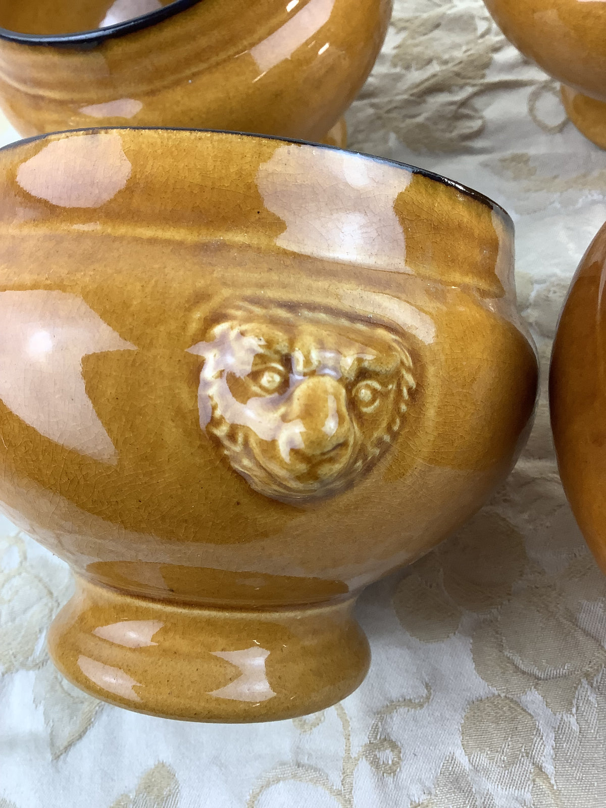4 antique glazed terracotta soup bowls – lion heads – Ref.: 18X