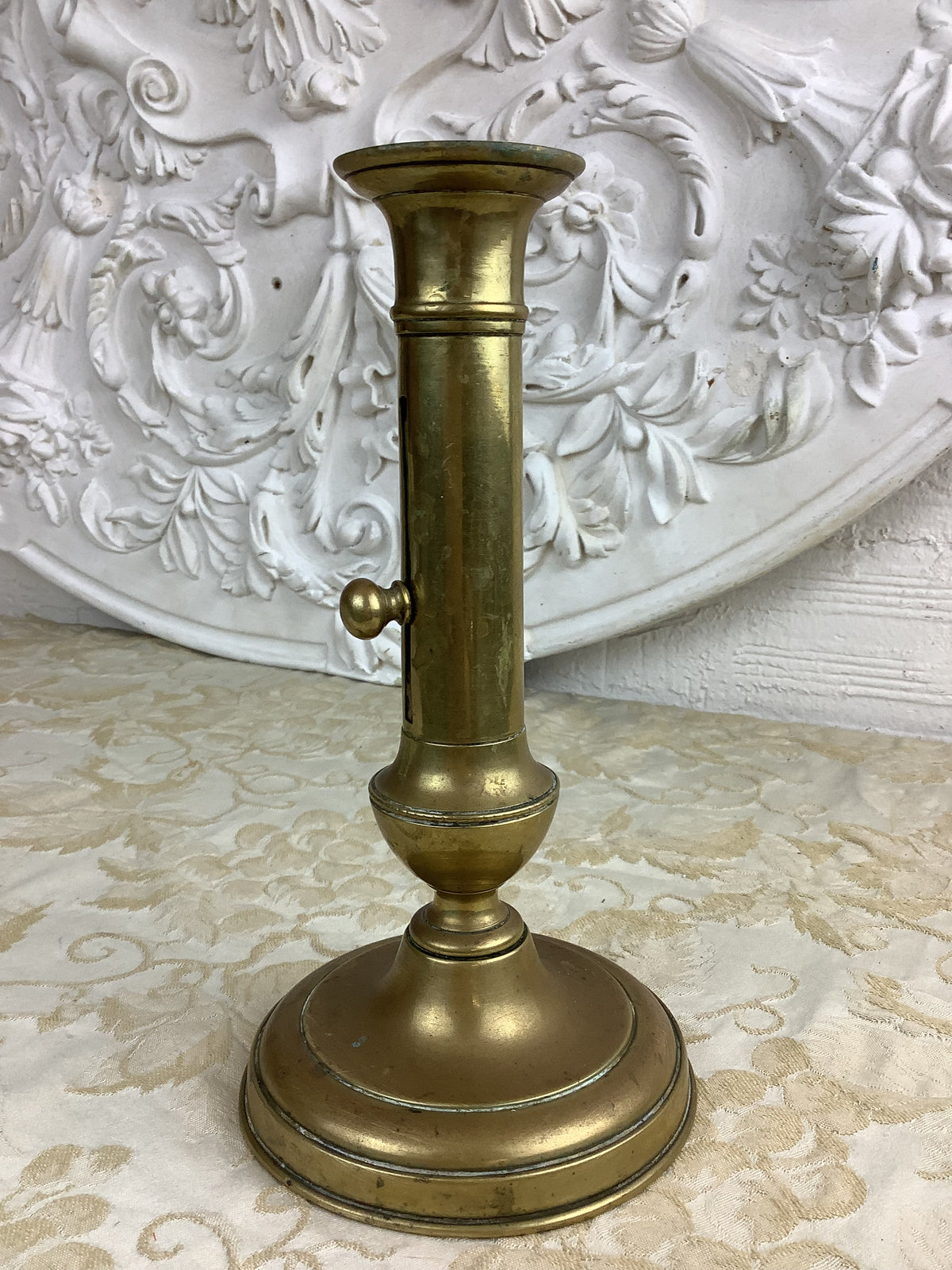 Vintage brass push-up candlestick – Ref. 26H