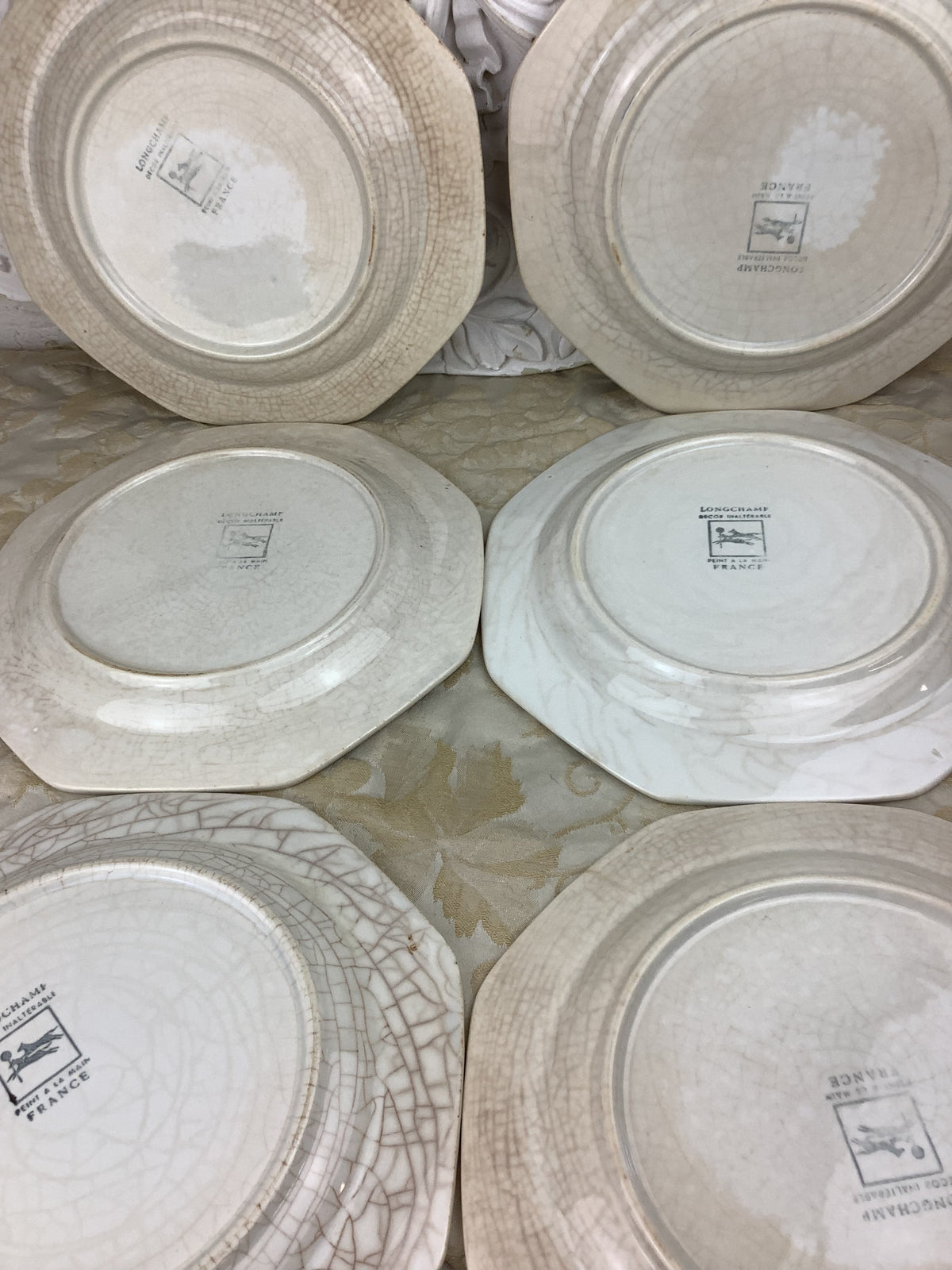 Lot de 6 assiettes plates octogonales de la manufacture Longchamp./ Réf 25V