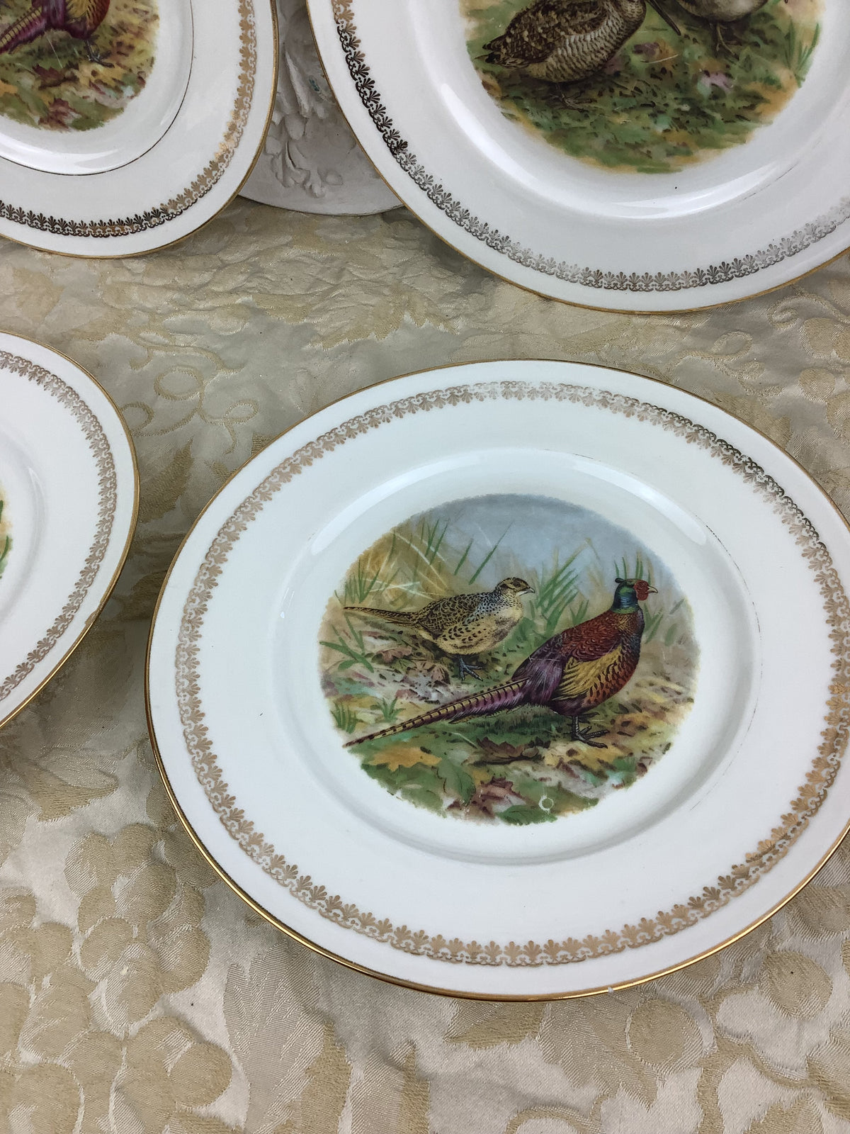 4 Assiettes plates en porcelaine de Limoges France décor gibier/chasse